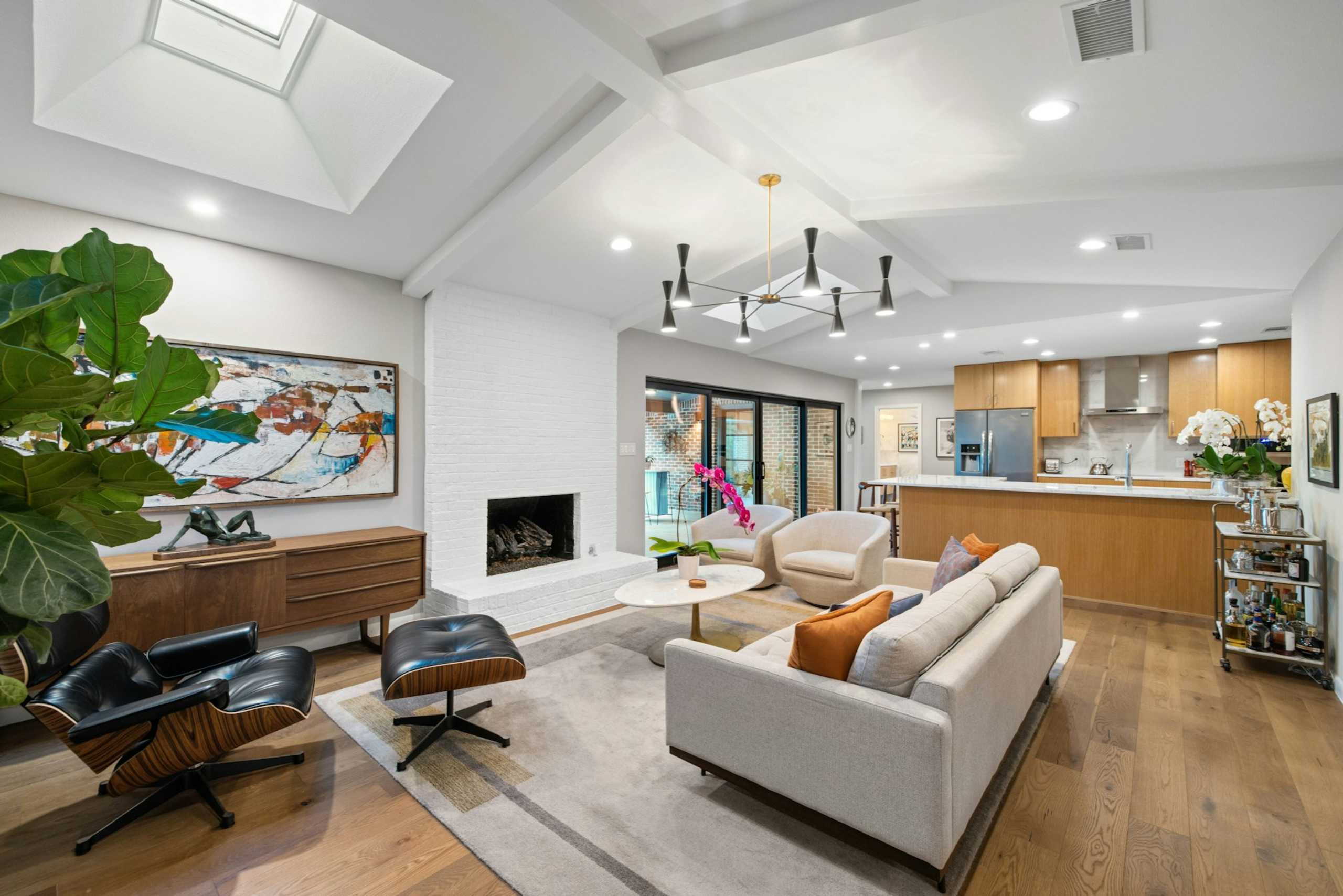 Custom rift-sawn oak cabinets, marble baths, Pella windows and Cantera doors