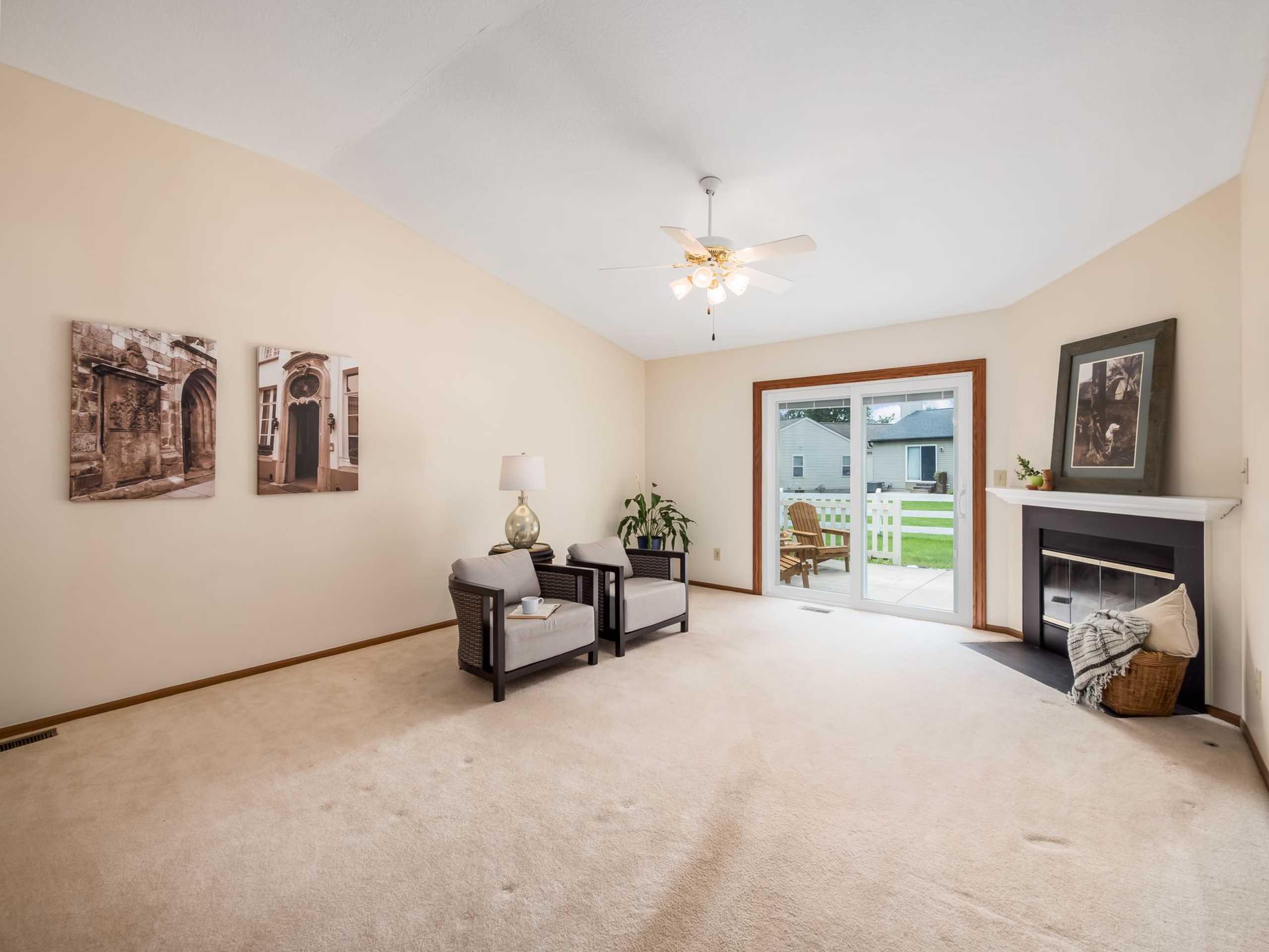 An inviting one-story condo home with a full basement and 2-car garage