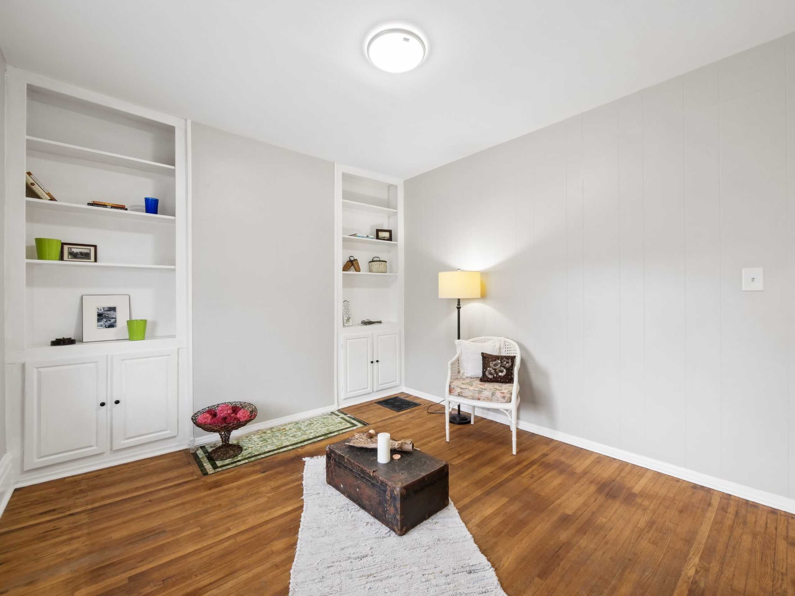 Wood floors, high ceilings, built-in cabinetry and some original charm intact.