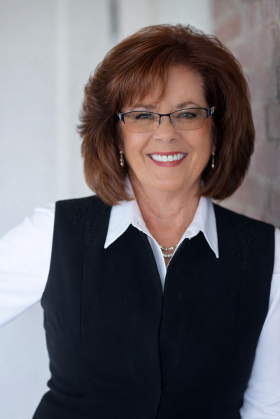 Cathy Corbett, Principal Broker; a KY Licensed Brokerage