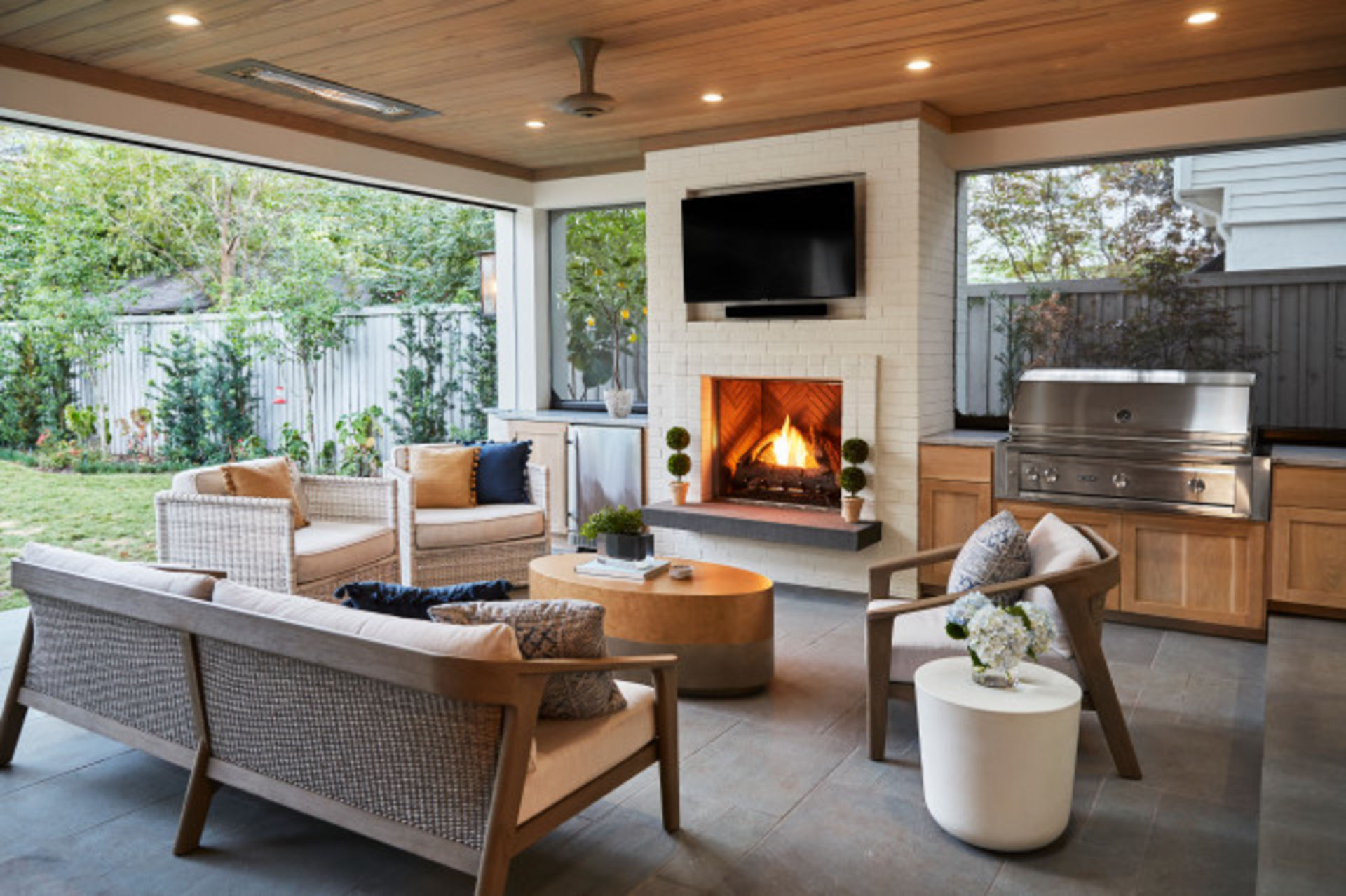 20 Covered Patios With Heartwarming Fireplaces