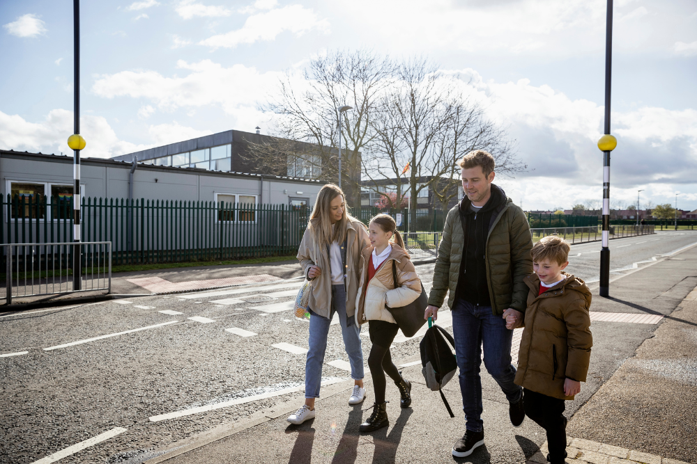 parents-walking-children-to-school parents walking children to school