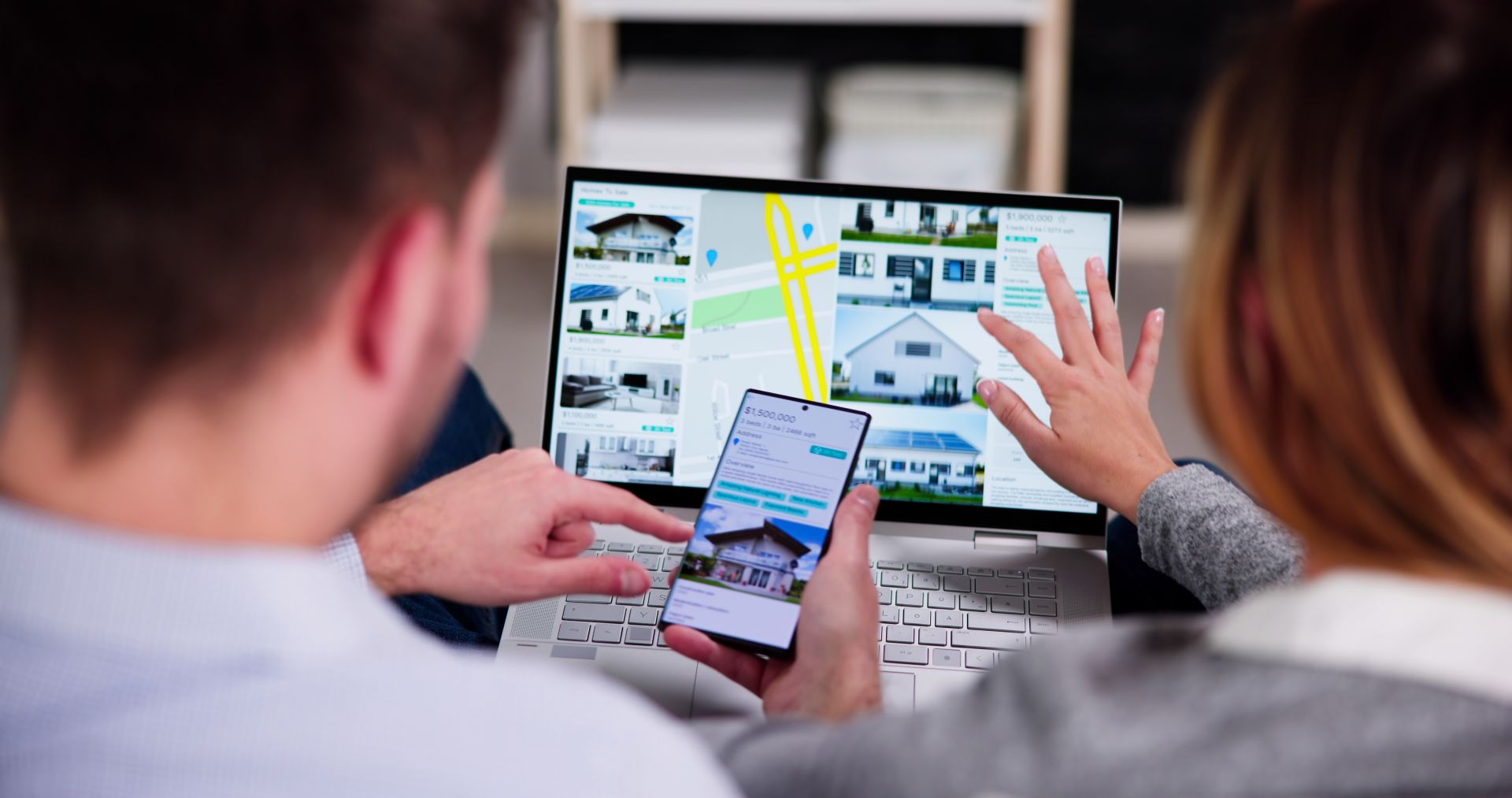 couple searching for home online