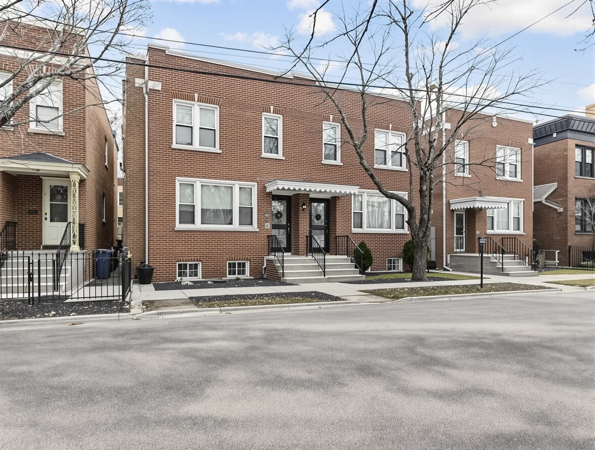 Classic brick residential buildings on a Chicago neighborhood street