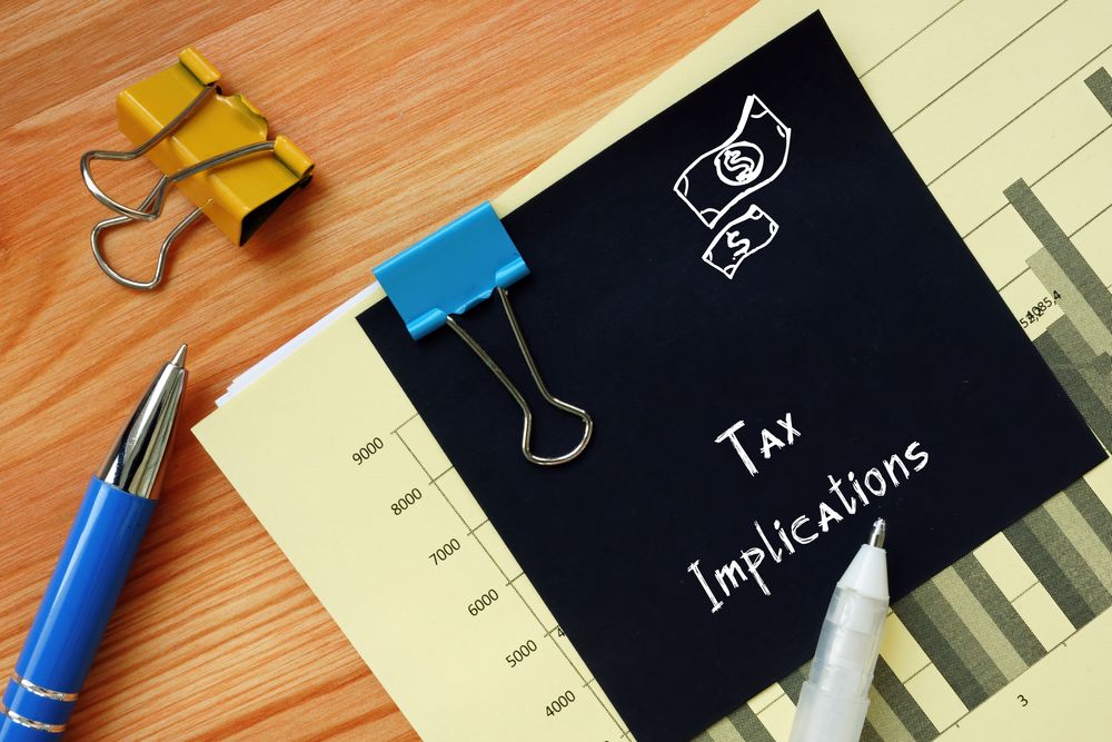 tax-implications-written-in-notepad tax implications written in notepad