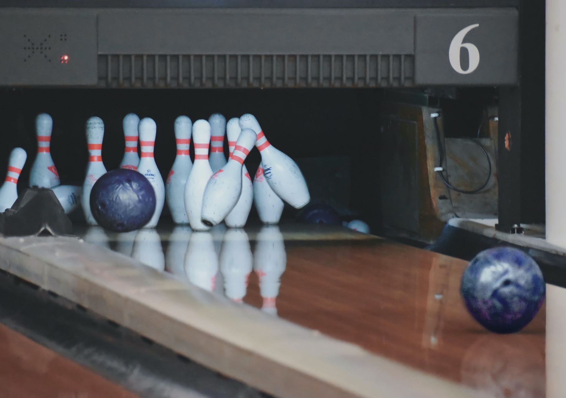 Bowling at Maple Hall Bowling ball in the lane headed for the pins
