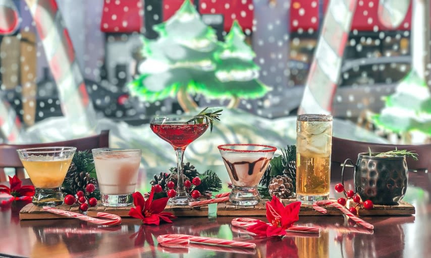 Winter Holiday glasses with drinks and festive sweets. Peppermint Trail Knoxville