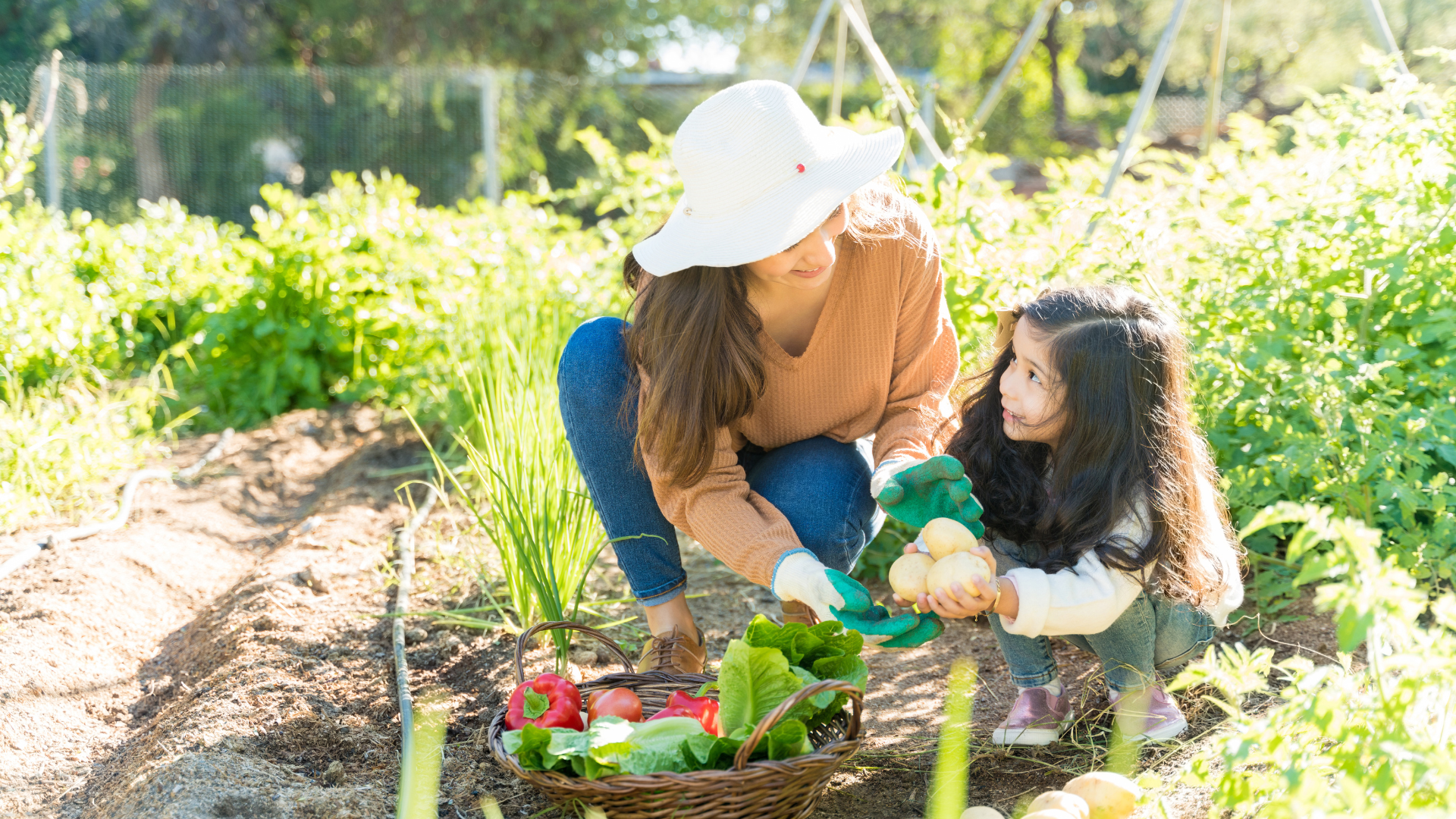 mother-and-daughter-planting-in-the-backyard mother and daughter planting in the backyard