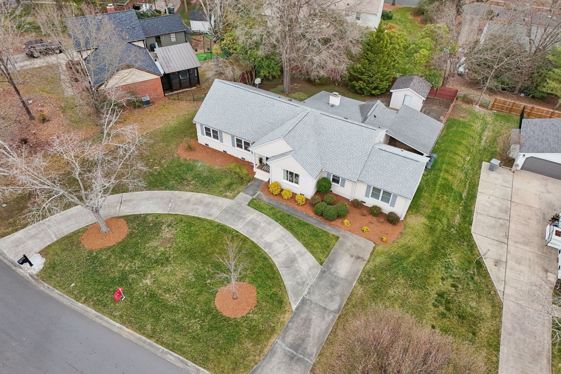 circular-drive-brick-ranch-charlotte.jpg Brick ranch with circular driveway in South Charlotte neighborhood