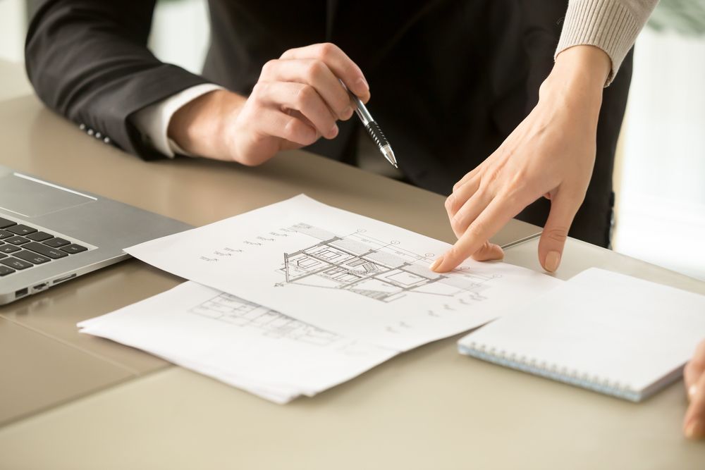 homebuyer looking at floor plan