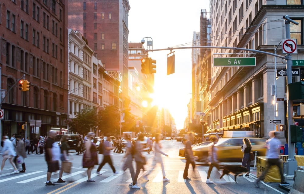 people-walking-in-pedestrian-along-busy-streets people walking in pedestrian along busy streets