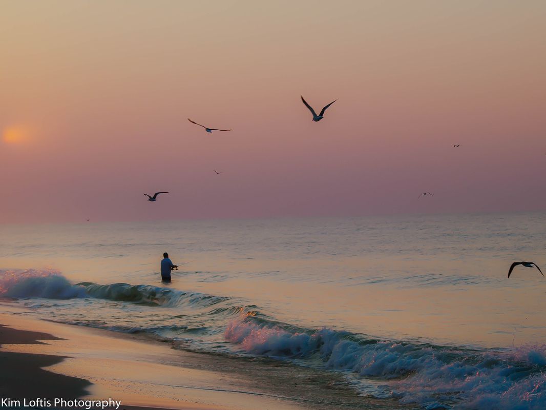 Kim Loftis Beach with fisherman