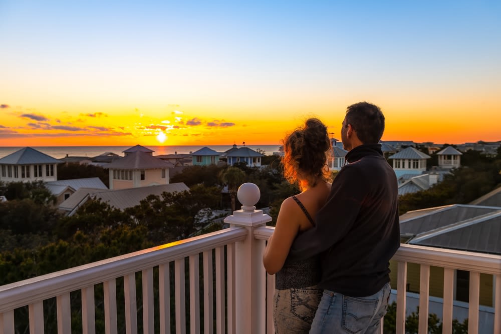 couple-living-in-coastal-watching-sunset couple living in coastal watching sunset