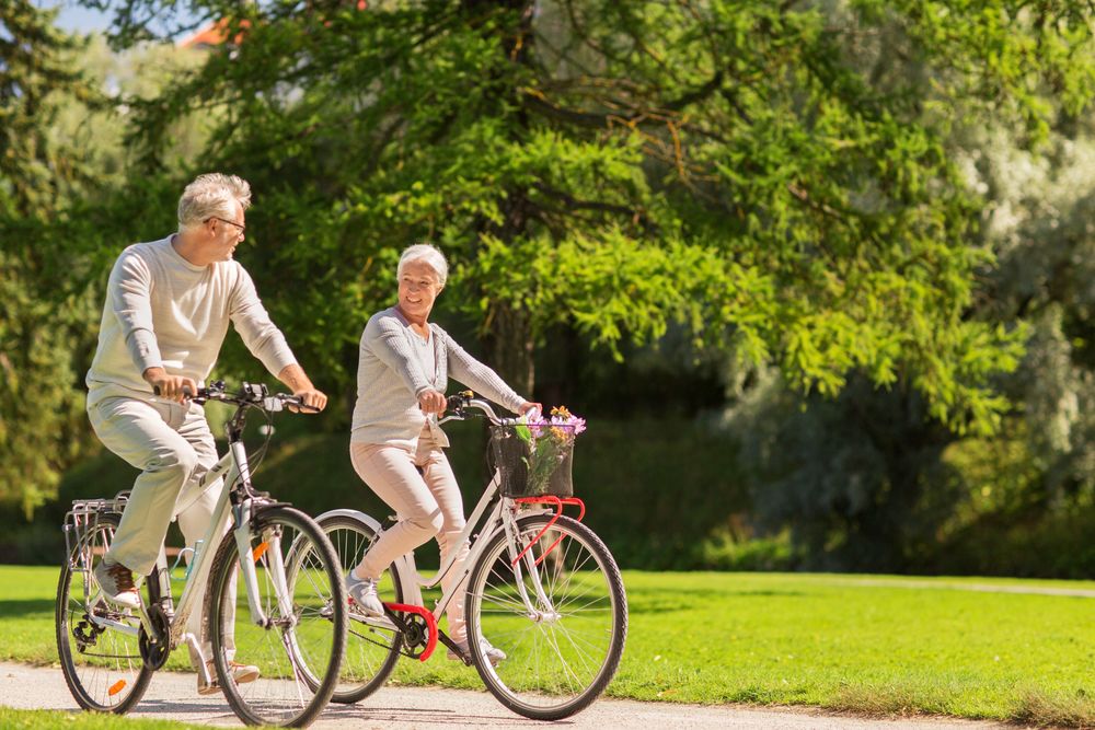Senior-Couple-Riding-Bicycles Senior Couple Riding Bicycles