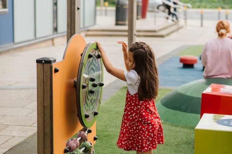 Kids love physical activity A kid playing on a playground