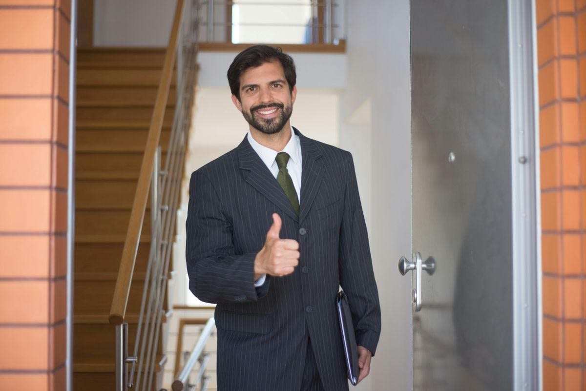Your home may reflect your taste, but buyers want to picture their life inside it Man in a suit