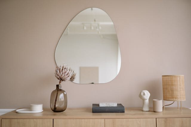 mirror wall above the cabinet