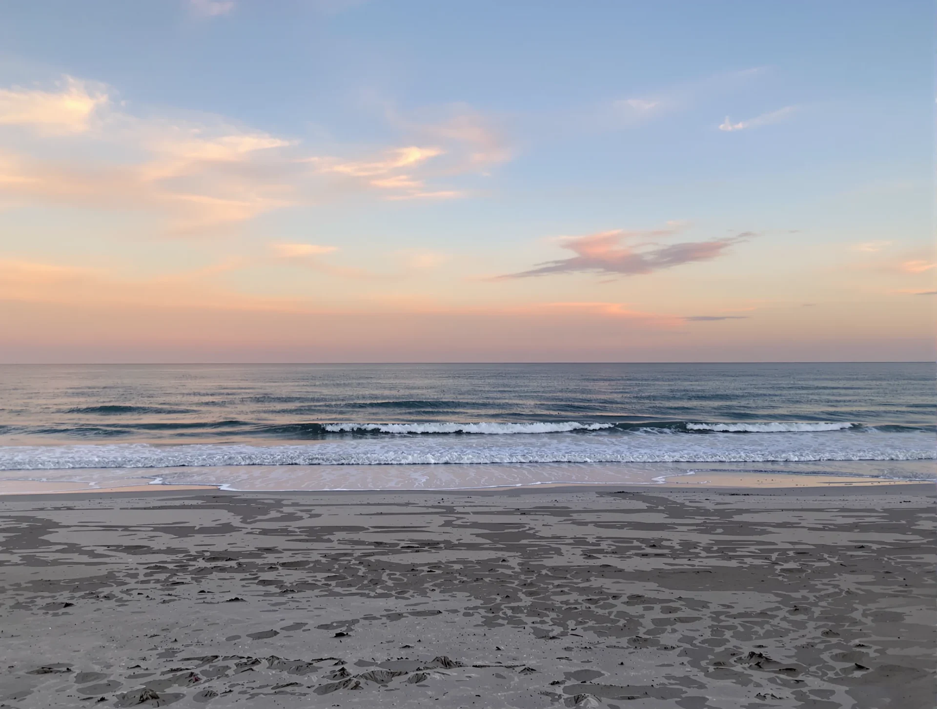 Sunset over the Gulf of Mexico along the shoreline in Venice, Florida