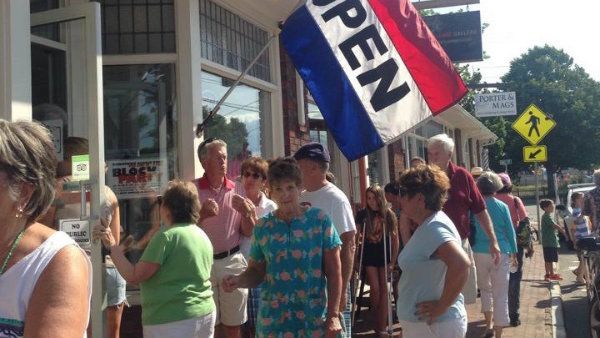 People walking along downtown Dennis Port in Cape Cod