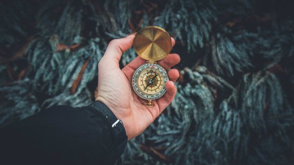 Using a compass to find way 