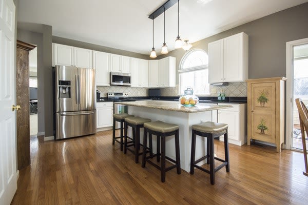 Kitchen painted Grey with a lot of natural light