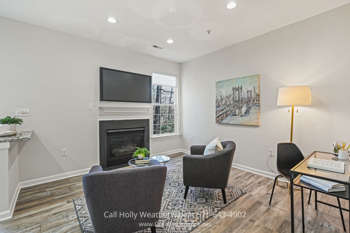 Reston VA Condos for Sale - Cozy up to the fireplace in this inviting family room for sale in Reston VA. This Reston VA home features the most sophisticated updates