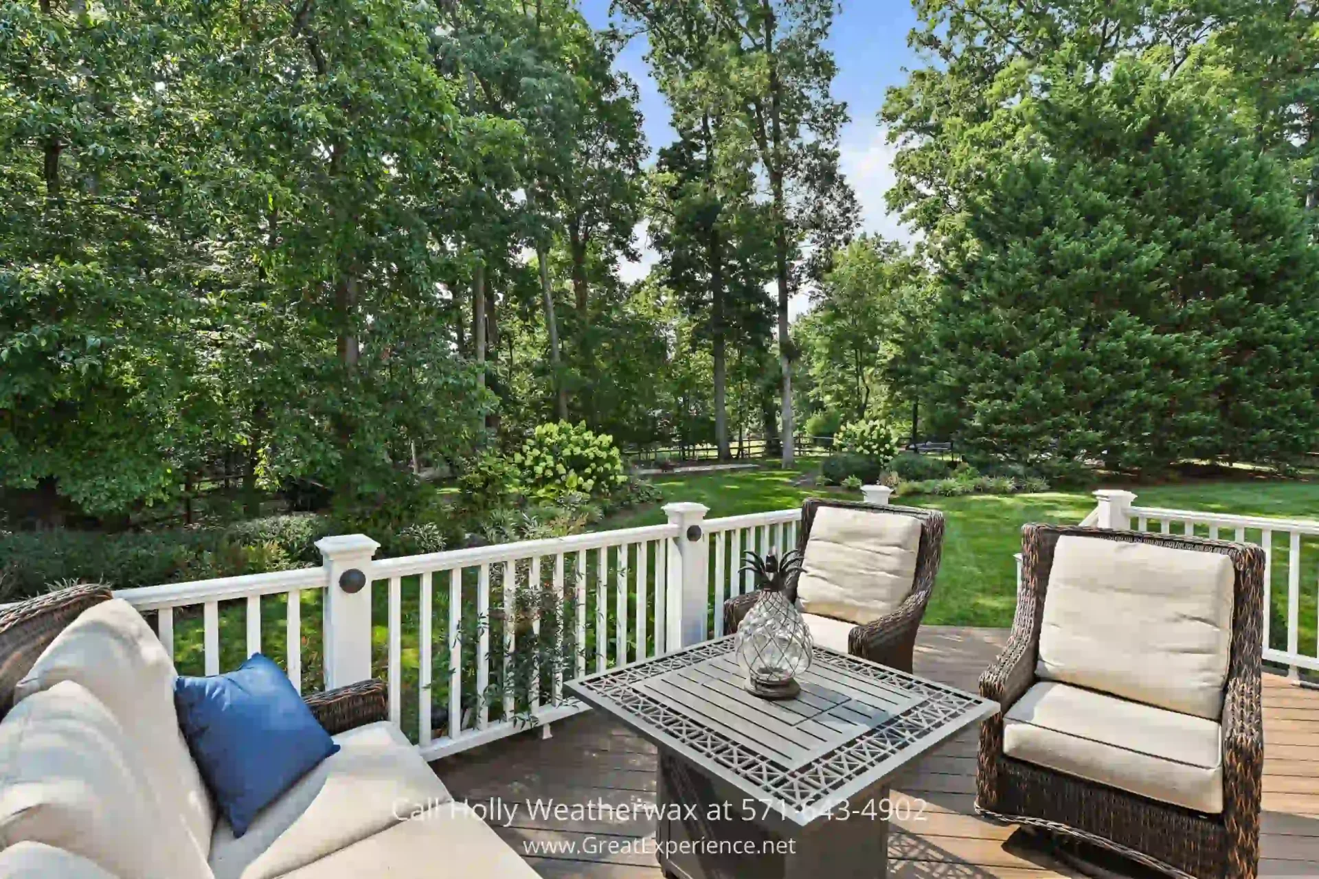 Luxury Home in Reston VA - This stunning property in Reston VA boasts a super functional floor plan and a spacious outdoor space! a deck with chairs and a table on it