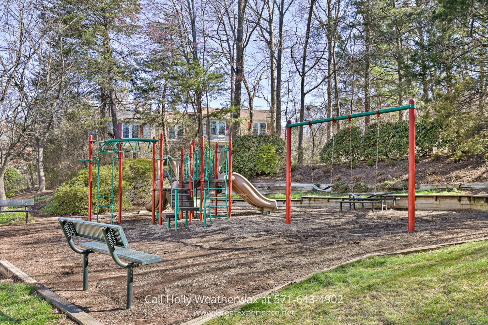 Homes for Sale near Reston Town Center - Close to Reston Town Center and North Point, this Reston townhouse offers easy access to community pool, tennis and pickleball courts, and Reston Paths, ensuring a vibrant lifestyle close to Metro. a playground with a swing set and a slide