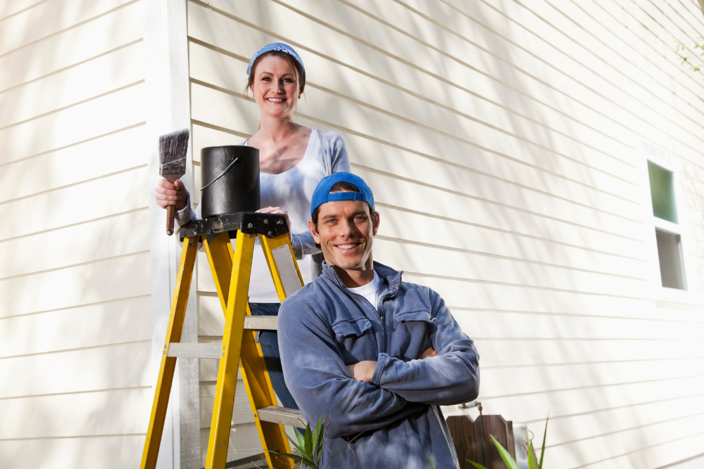 a-couple-painting-their-house a couple painting their house