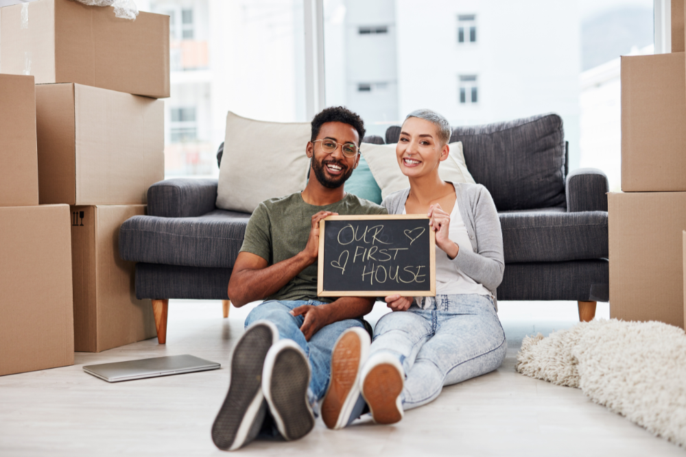 First-time-home-buyers-couple-in-their-new-house First time home buyers couple in their new house