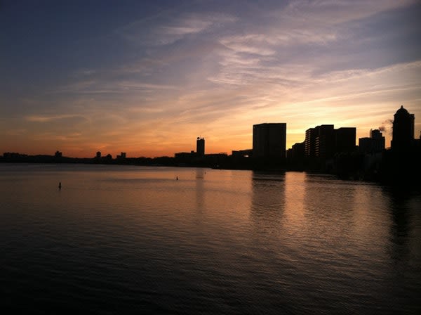 Boston Skyline at sunset overlooking Boston Harbor