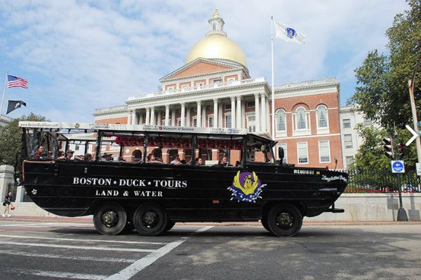 Picture of a Duck Boat Going Past State Building