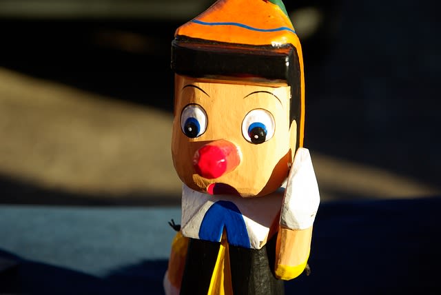 A Pinocchio Puppet with his nose out since he lied