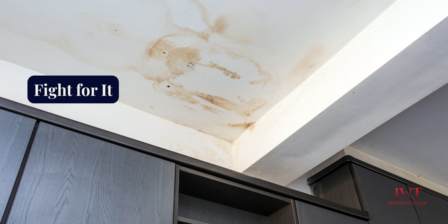 Water stain on ceiling indicating active roof leak or water intrusion in a Marysville Ohio home inspection