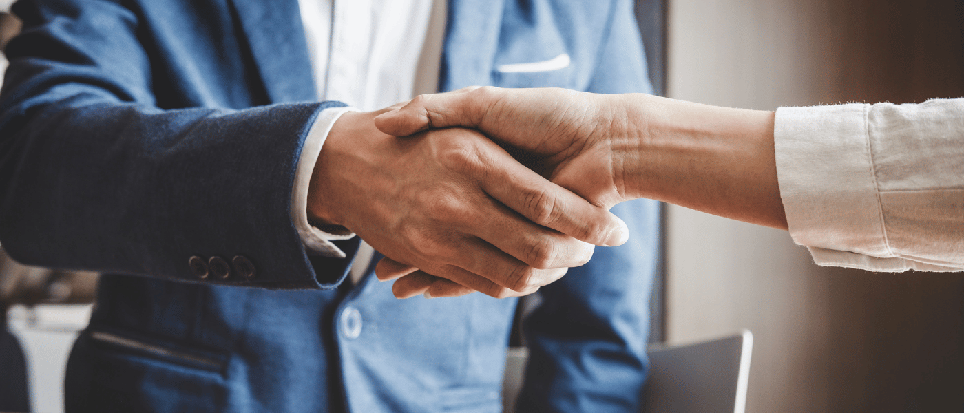 shaking hands - real estate investiment