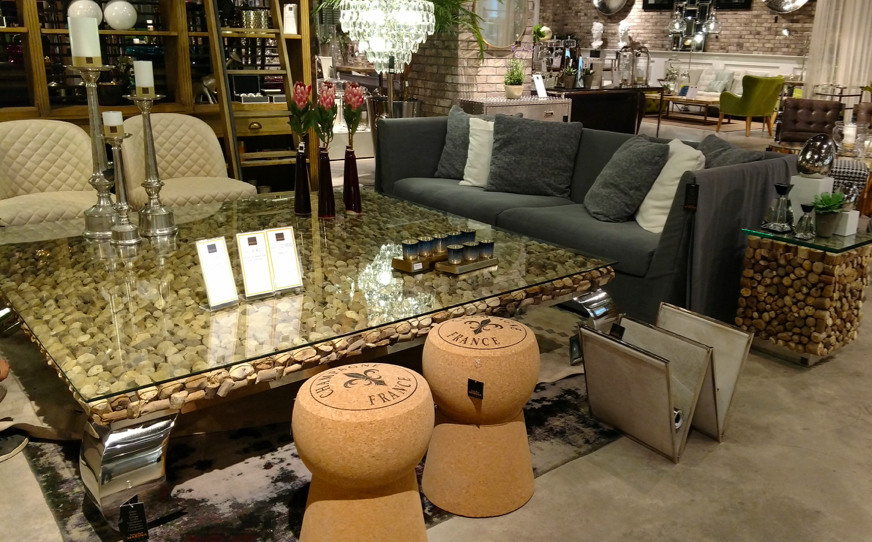 The cork-shaped stool and the gigantic coffee table