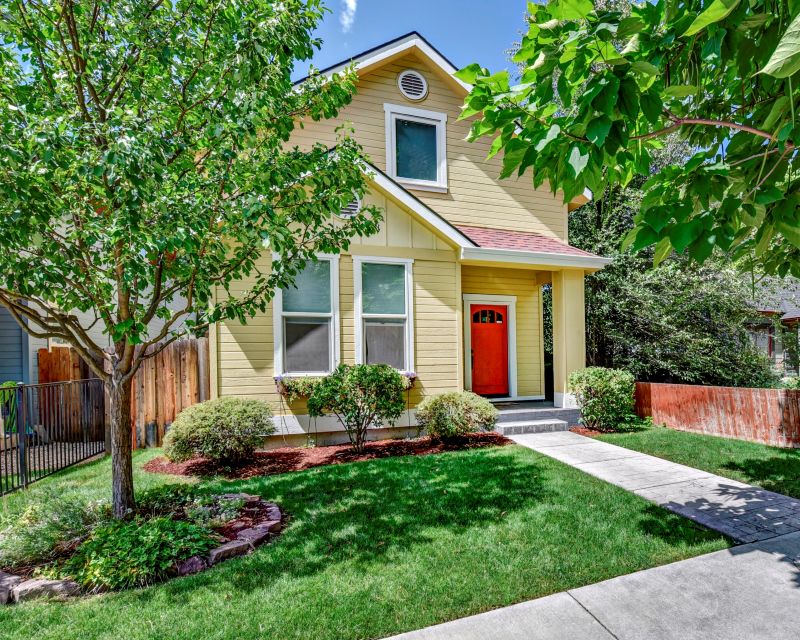 Front of tidy yellow house in Boise's North End