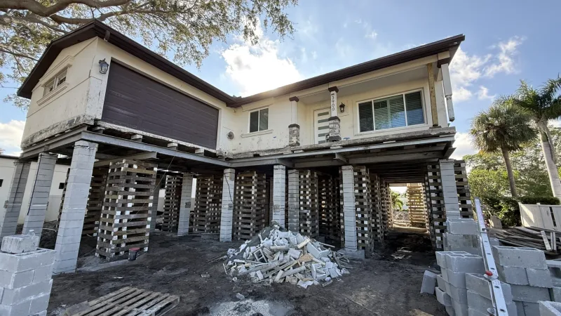 Shore Acres home lifted onto concrete piers for flood mitigation (2025)