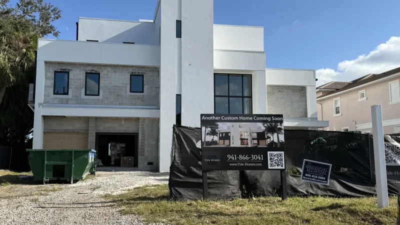 Contemporary elevated new construction in Shore Acres showing multi-level design (2025)