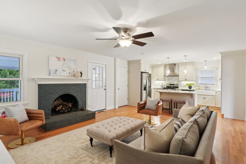 Open floor plan connecting kitchen and family room in Charlotte home