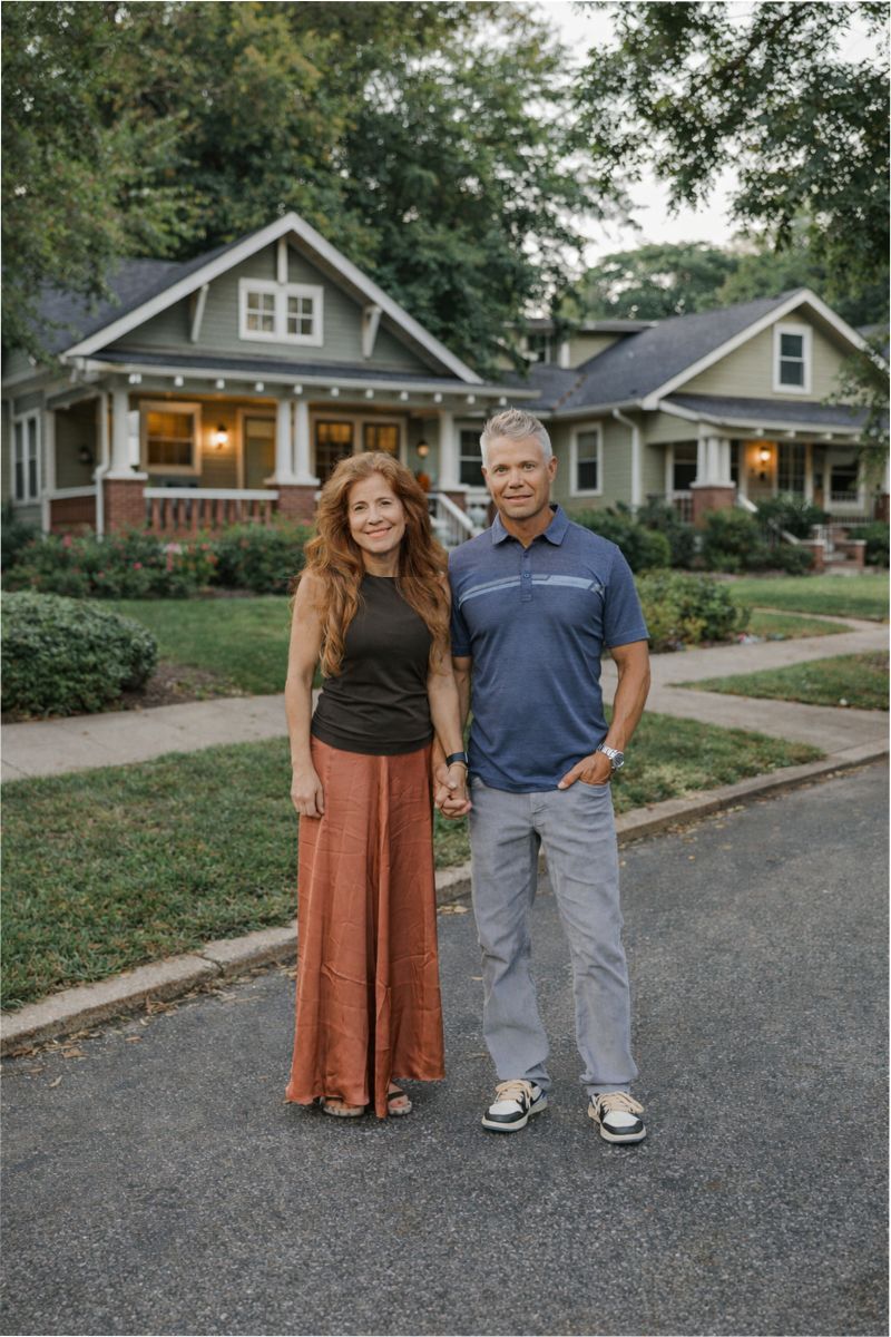 Chris and Stacy Carter, Dilworth real estate advisors, walking in established Charlotte neighborhood