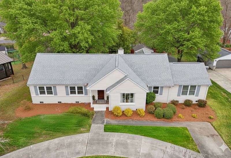 Large lot with mature trees in South Charlotte established neighborhood