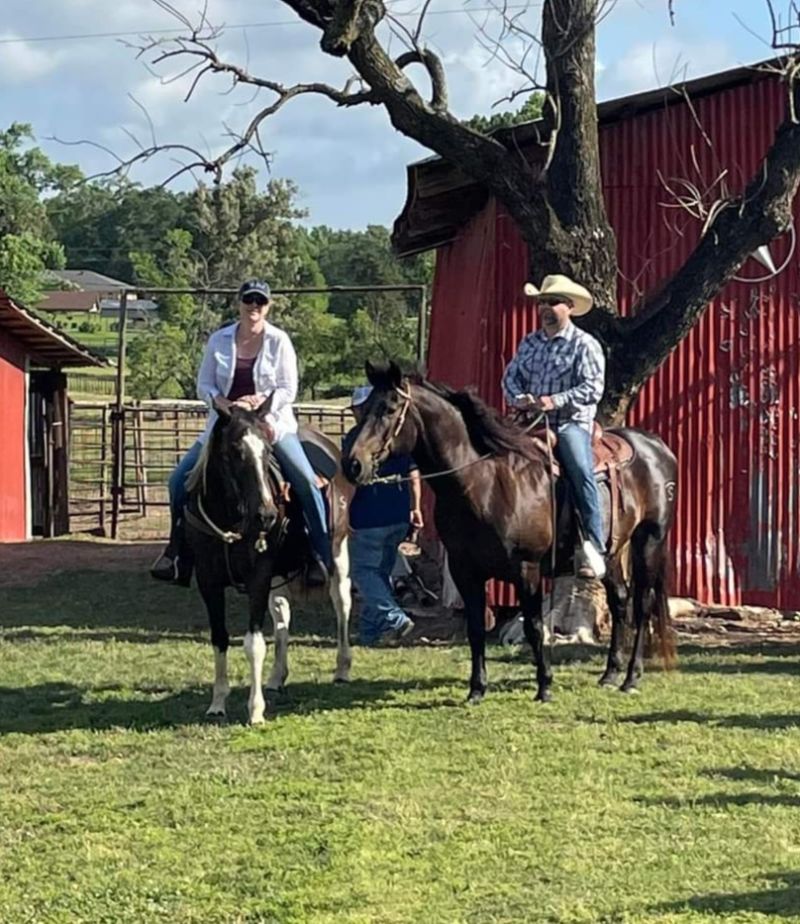 Marty and Melissa Summers - Riding at SWCC Event - Carthage Texas Country Roots Realty, Melissa Summers Realtor, Carthage Texas Realtor, Panola County, East Texas Realtor, East Texas, Realtor, buyer's agent, seller's agent, real estate agent, realtor near me, realtor near carthage