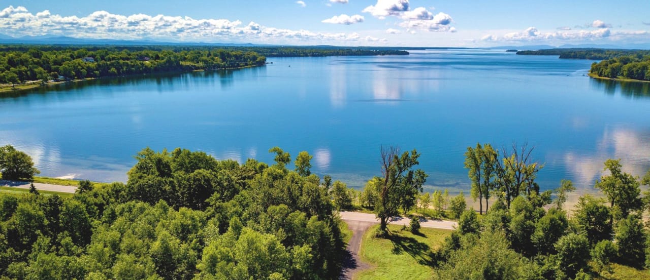 Grand Isle inception-app-prod/OGZiODFkMWUtN2UyYy00NDY0LTljMzQtZmQyYWJlZGI2OTE1/content/2021/05/waterfront-land-for-sale-in-alburgh-vt.jpg