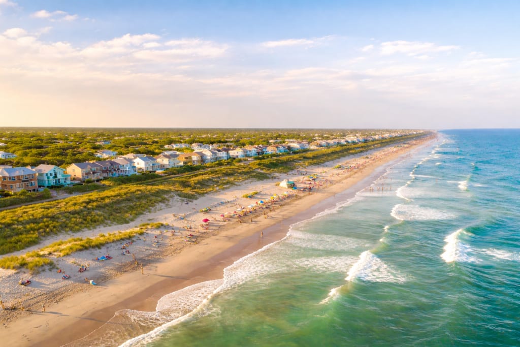 The Best Beaches in North Carolina: A Guide to the Coast inception-app-prod/MGFlMTEwOWYtMDNmMy00NzlmLWEyYTgtYzA1OGJiZDk4YjJi/content/2026/03/942dc0710d38d9dcc65593947c4e509fc5cb0bda.png