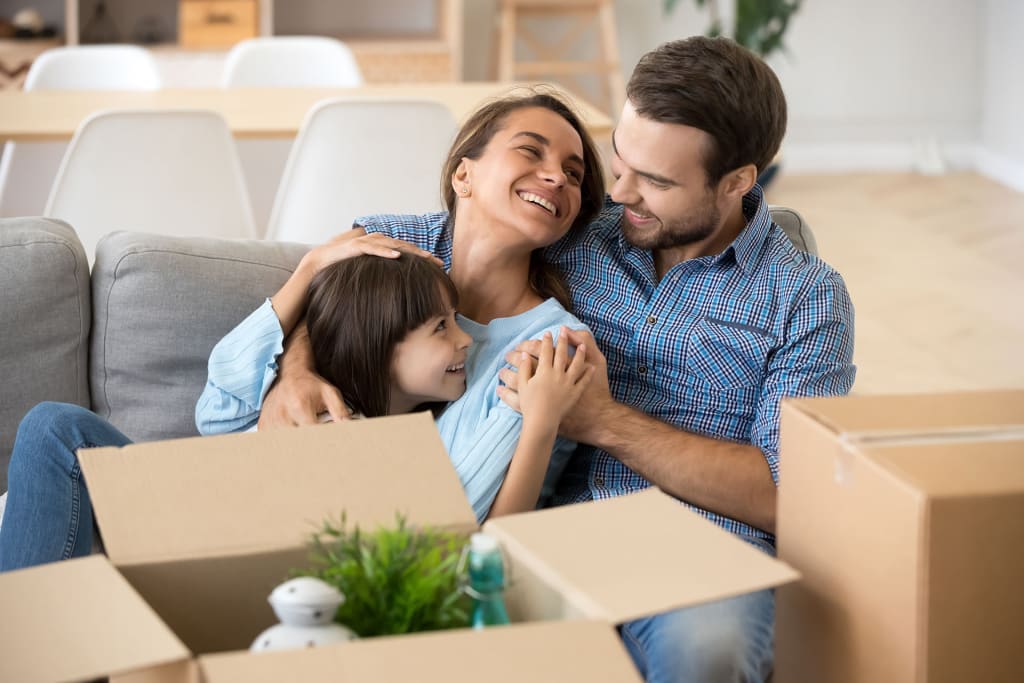 On Track Realty inception-app-prod/MjFlNTY5NzktNDFjMS00N2ZiLTg4ODUtYzBjOWM2NDQxMWEy/content/2021/02/smiling-young-family-kid-hug-cuddle-1401411398.jpg