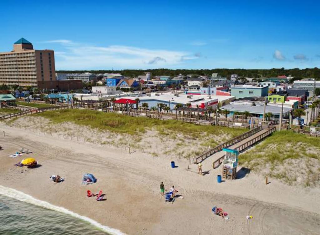 Celebrate Carolina Beach's Centennial Year! inception-app-prod/OTMwNWQ5NTktMGUzYi00Y2MyLTkyYWEtNTk2ZjZiOTQwOGE0/content/2022/02/62ccba9131d21b426d6f46c7aeef63259d40b319.jpg