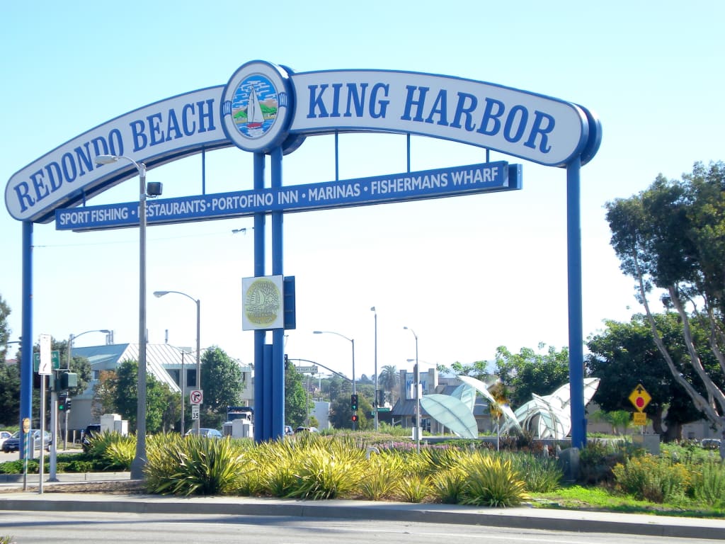 PATIENCE IS KEY FOR BUYING A HOME IN REDONDO BEACH inception-app-prod/YjlmNmQzMjktNGM2Zi00ZmNkLTg4NGUtYmUyNDViZWQ5ZDMz/content/2018/02/Redondo King Harbor sign _ Diana Turner.jpg
