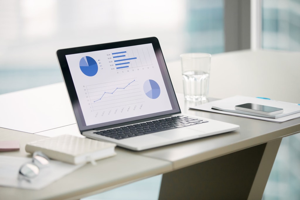 inception-app-prod/ZWU2OTVhMjgtMWI0ZS00ZmMxLTk3ZmEtODFkODgxMjkzNThj/content/2021/04/Closeupoflaptopwithgraphsonscreenonwhitemodernofficedeskpreparationforformalmeetingoftheboardofdirectorseffectivemanagement.Officeinterior.Businesssuccessconcept.Closeup1.jpg