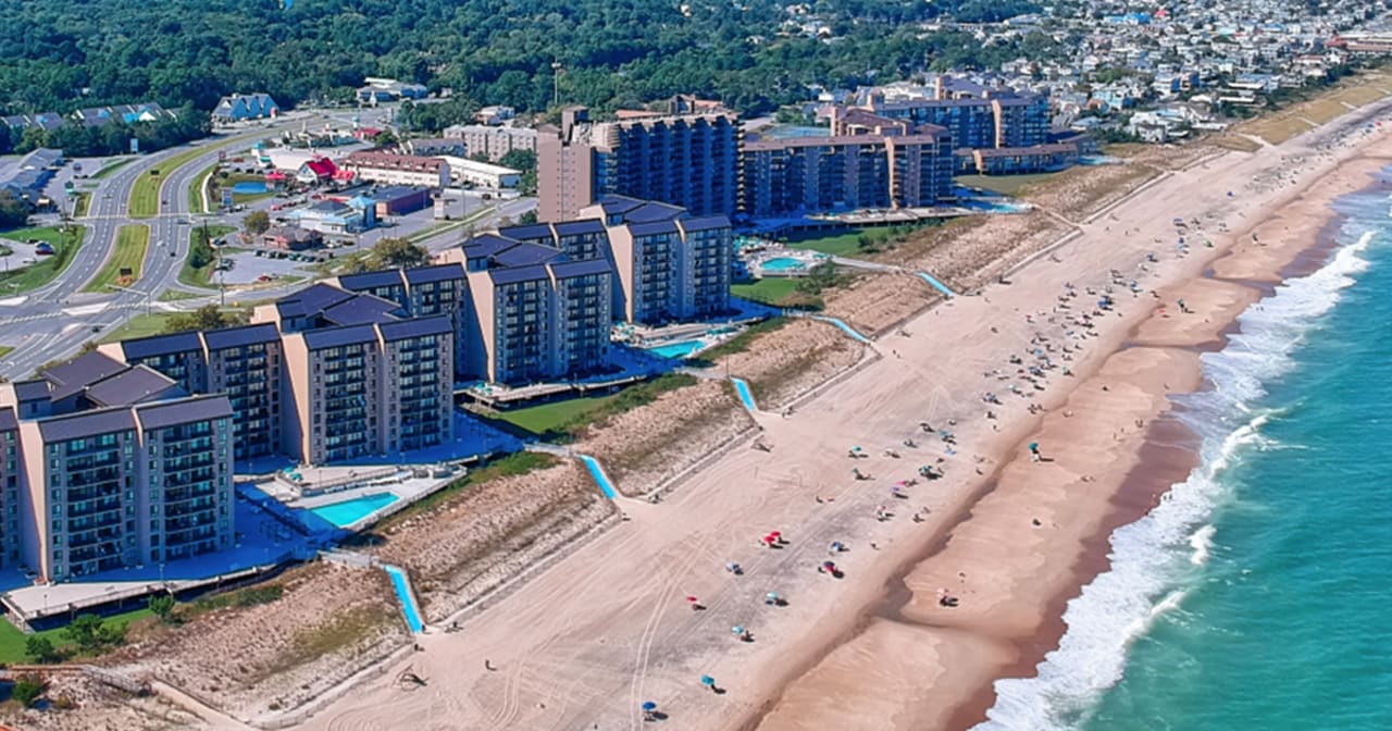 Sea Colony DE Beach Condos inception-app-prod/NTBmZTc1MmItNWRkZi00MWQzLThkMWMtMWYwNzc2YjIzODhi/content/2021/06/CoastalDESeaColonyBeachCondosFeature1200x630.jpg